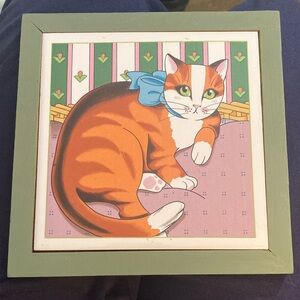 Charming Cat Wall Art with Blue Bow trivet